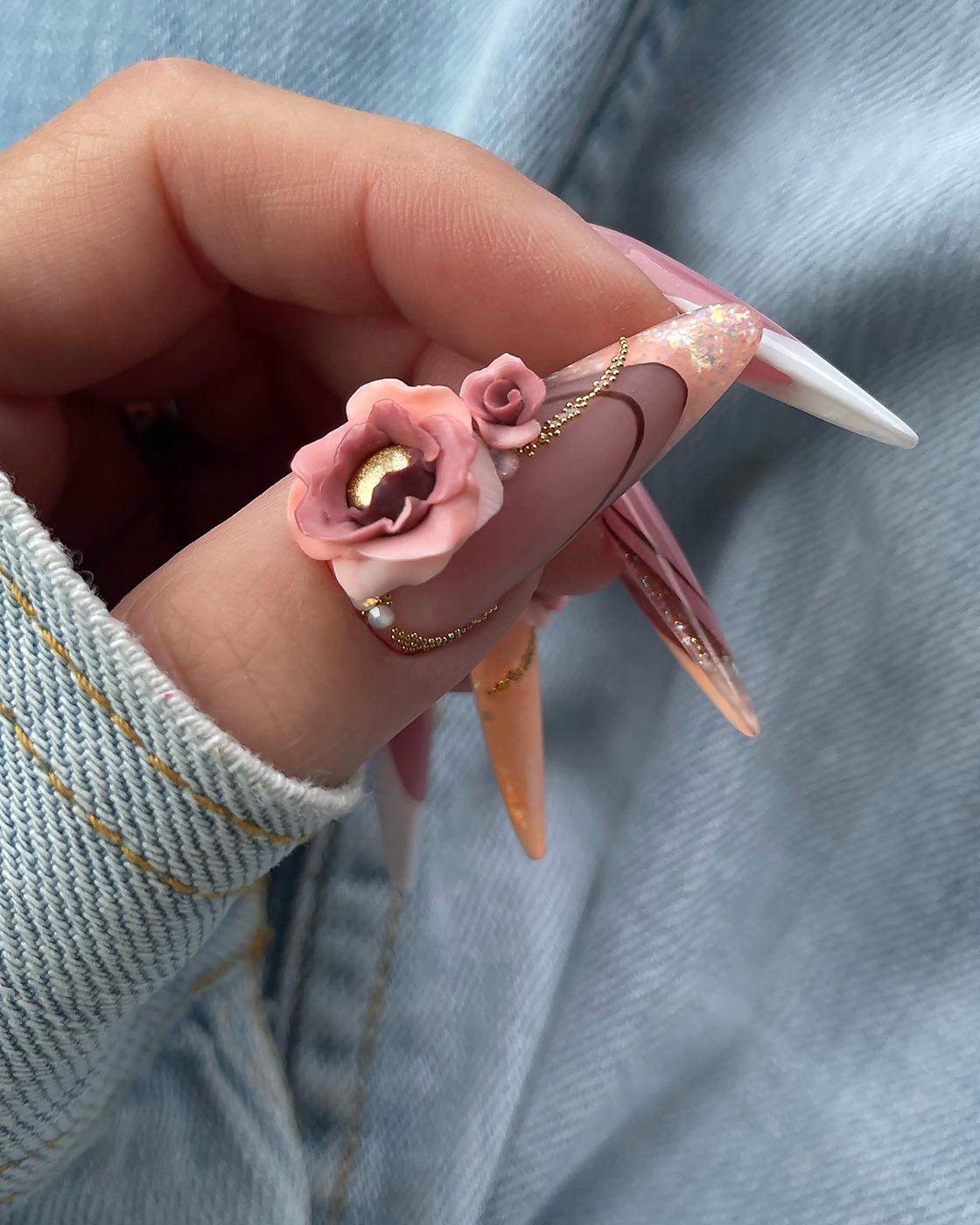 Hand-sculpted 3D rose nail art by Diana Vig